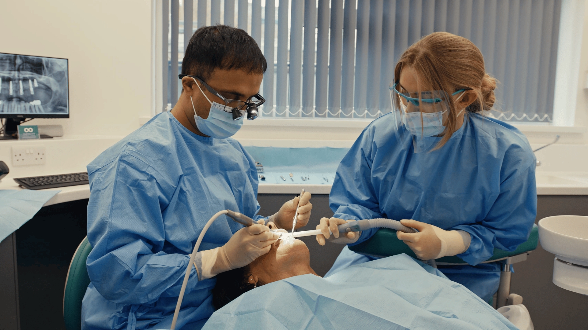 Dr Mohsin Patel performing Straumann dental implant surgery at Infinity Dental Clinic Leeds and Harrogate
