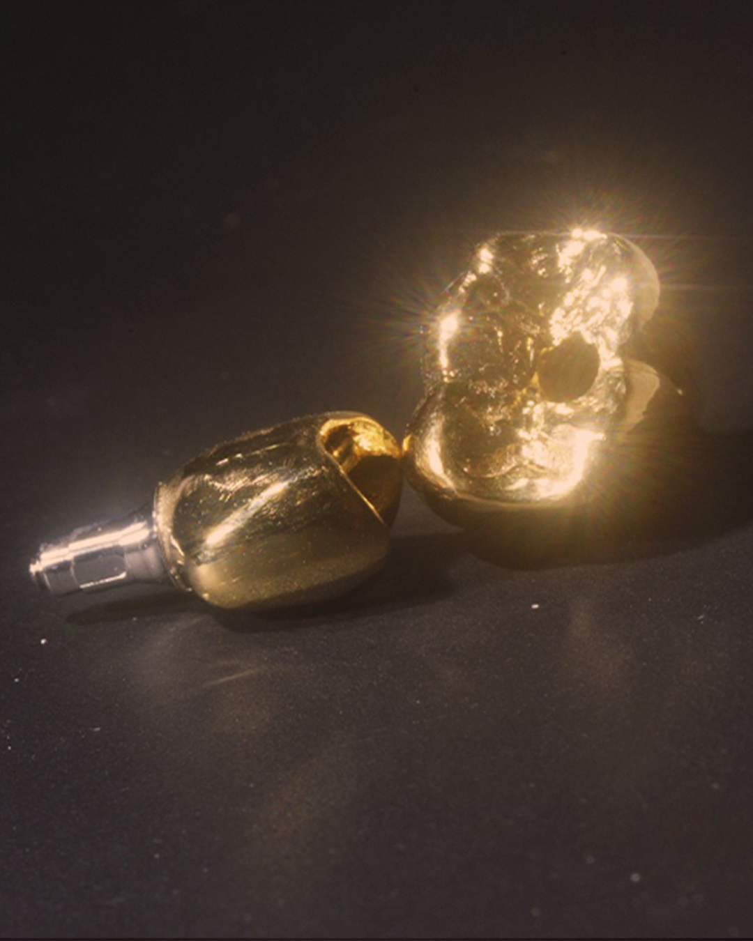 Full Arch Dental Implants Leeds and Harrogate Metal alloy dental crown in gold or silver used for strong tooth restoration at Infinity Dental Leeds