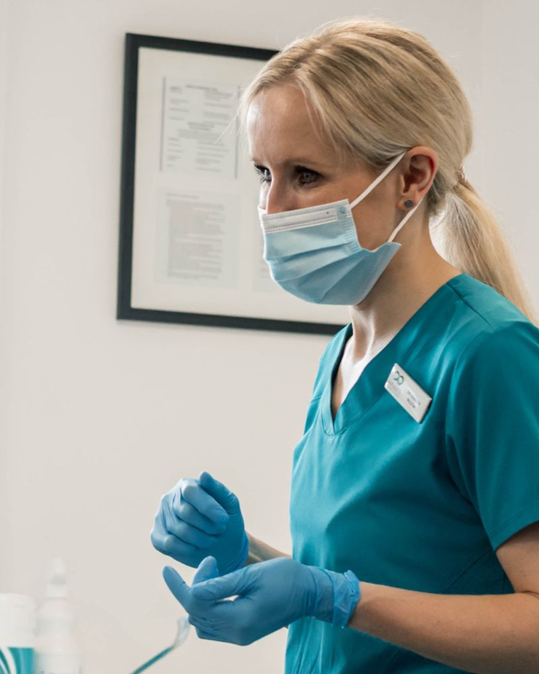 Full Arch Dental Implants Leeds and Harrogate Dr Hannah Wilson at Infinity Dental Leeds explaining PFM crowns with metal substructure and porcelain layering